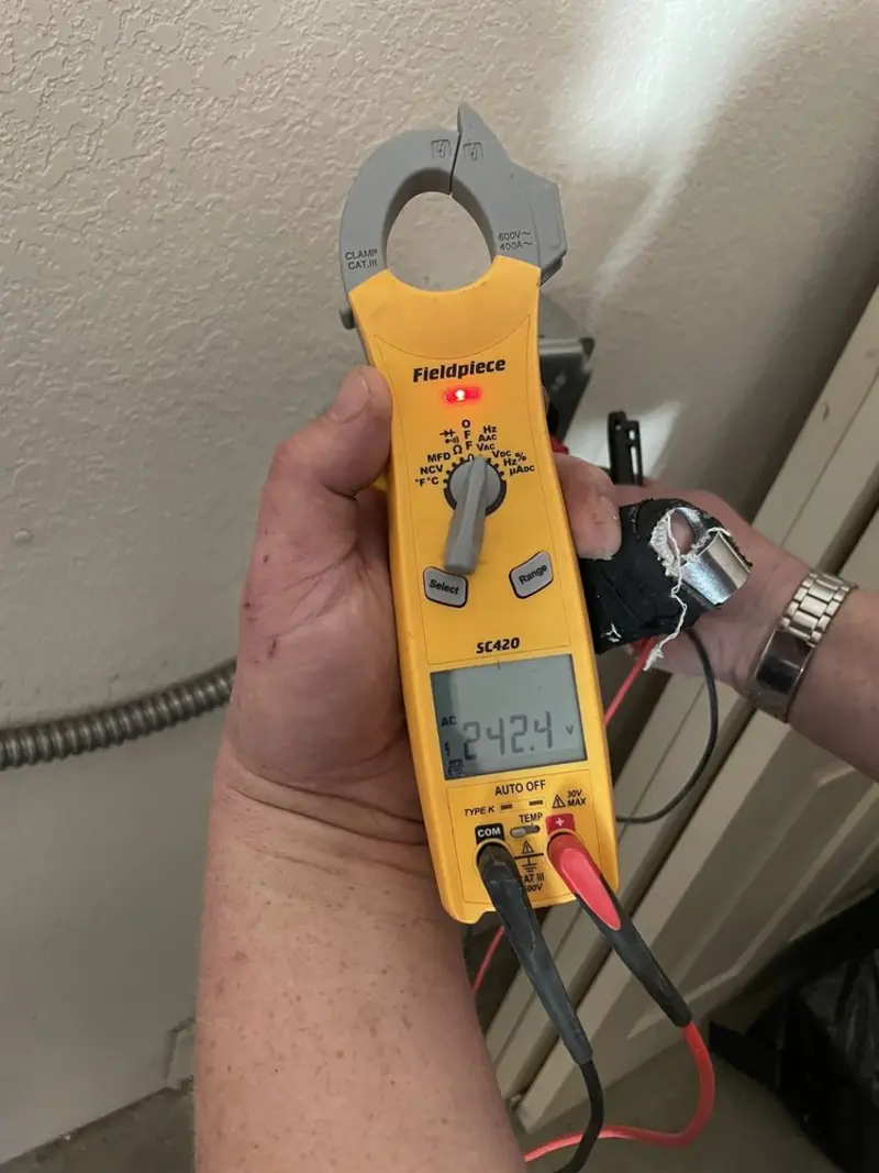 Voltage testing with clamp meter during Circuit Breaker Repair in Ammon